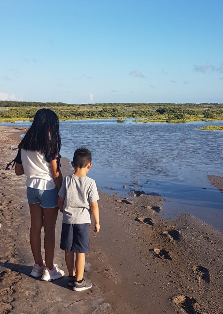 children on proposed LNG site 